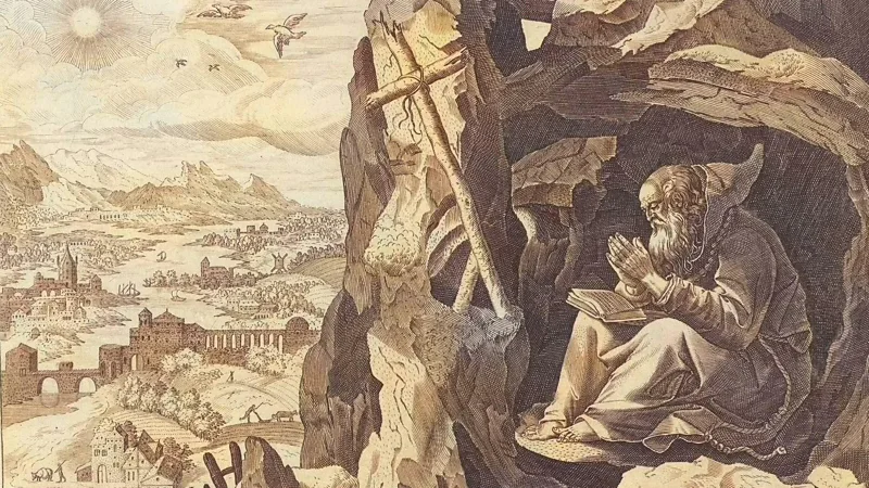 Medieval hermit reading beside a cave
