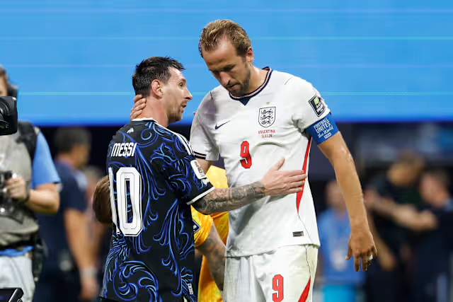 Lionel Messi speaks with England captain Harry Kane after Argentina's World Cup semifinal win